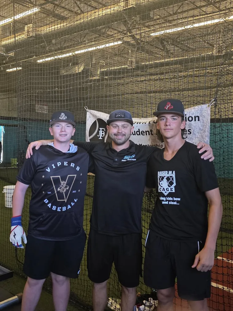 Sean Ramalho with two of his former players at 520 Elite Hitters Club in Casa Grande, Arizona